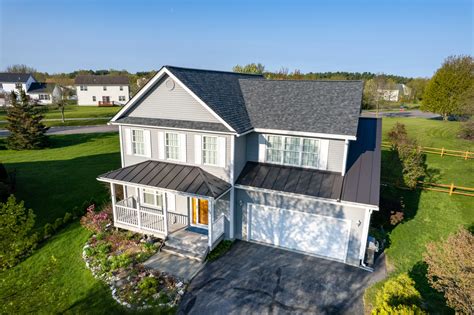 metal roof on a colonial house|contemporary metal roofing.